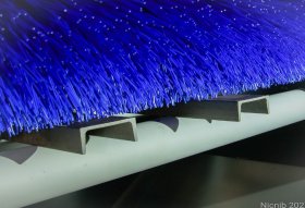 Efficient and effective removal and reuse of abrasive material